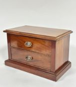 An Edwardian mahogany nest of two drawers the rectangular top with moulded edge above two short