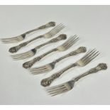 A set of seven Victorian Glasgow 1868 silver fiddle and shell pattern dessert forks with engraved