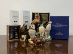 A collection of five Whyte and Mackay novelty whisky decanters by Royal Doulton, each modeled as a