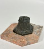 An Art Deco pink marble diamond shaped ink stand with bronze mounted Capstan style ink well with