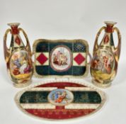 A pair of Vienna style ovoid two handled porcelain vases decorated with Roman style scenes with gilt