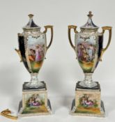 A pair of Continental 19thc two handled urn vases complete with covers decorated with Roman scenes