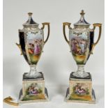 A pair of Continental 19thc two handled urn vases complete with covers decorated with Roman scenes