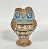 A Doulton Lambeth silicone ware standing owl jar and cover, left eyebrow restored, decorated with