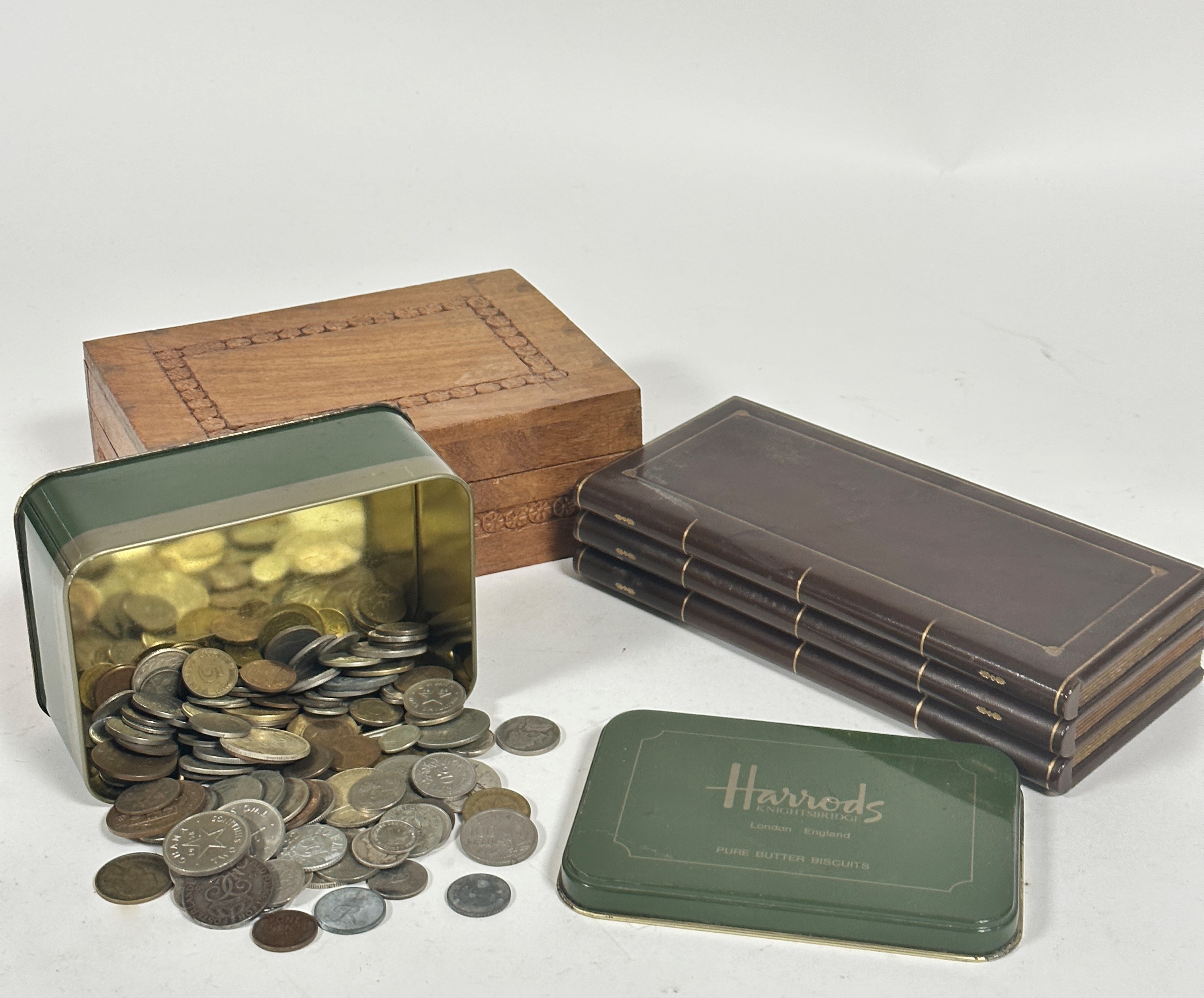 A leather covered full book cork lined cigarette box (h 4.5cm x 20cm x 9.5cm) top slightly marked,