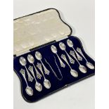 A set of twelve Sheffield 1919 silver pierced scrolling bright cut handled teaspoons complete with