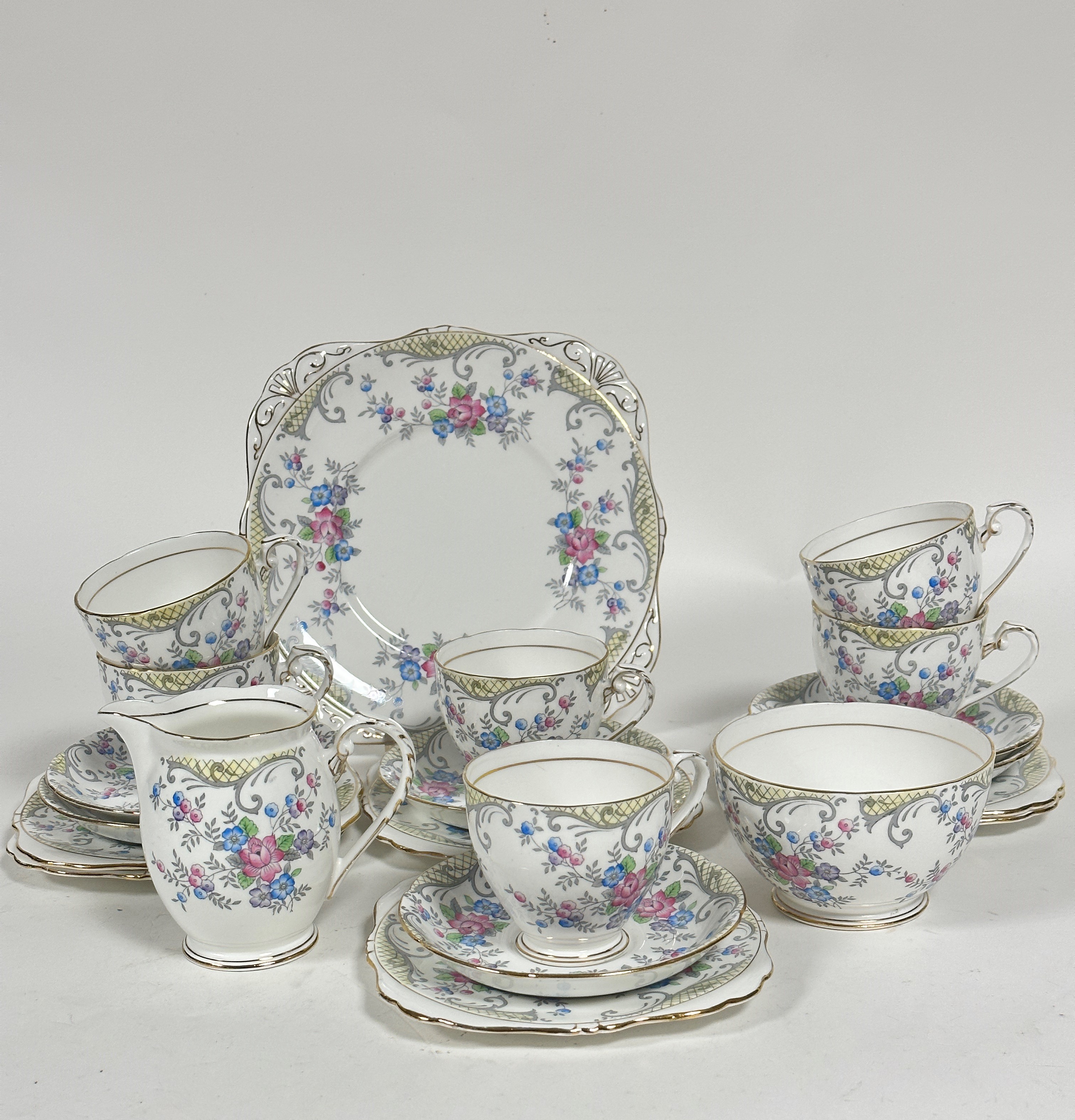 A Grafton china twenty one piece tea set including cake plate, five cups, six saucers milk jug,