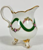 A French Boyer baluster cream jug with scalloped top decorated with handpainted floral swags,