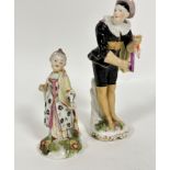 An 18thc porcelain figure of a lady with cap and overcoat, one arm missing, chips to robe, and to