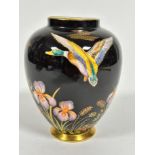 A Carlton Ware tapered cylinder vase decorated with mallard duck and iris design, signed verso,