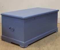 A 19th century blue painted pine blanket box with plain interior and carry handle to each end,