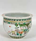 A modern Chinese fish bowl decorated with scenes of two females with a group of children playing