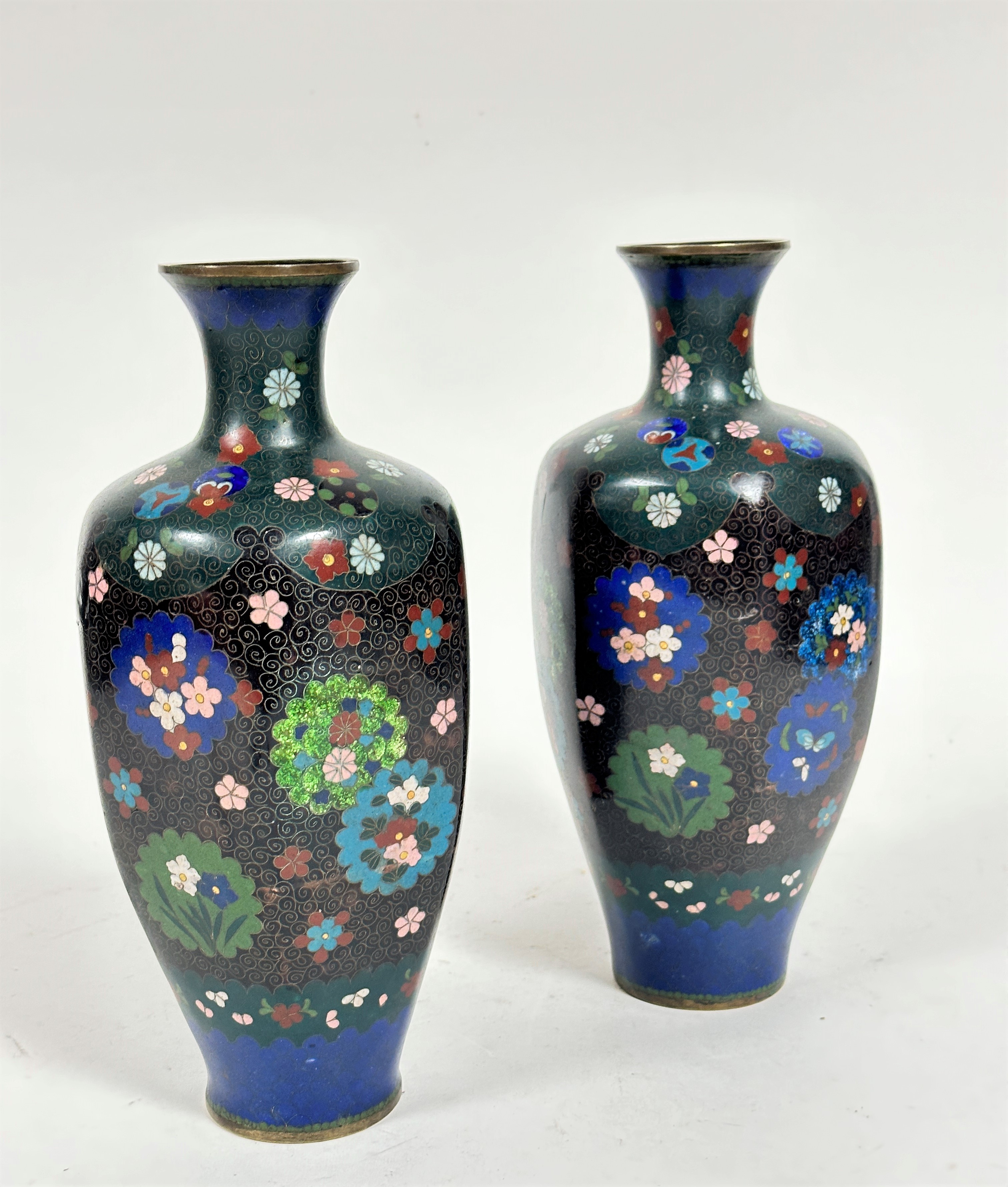 A pair of Japanese cloisonne octagonal baluster tapered vases decorated with chrysanthemum flower