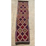 A Kilim runner rug, of all over geometric design, 286cm x 74cm