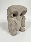 A carved pumis stone owl with hollow eyes (h 34cm x 22cm x 14cm)