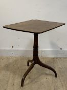 A Georgian mahogany tripod table, the square top raised on ring turned column and triple inverted