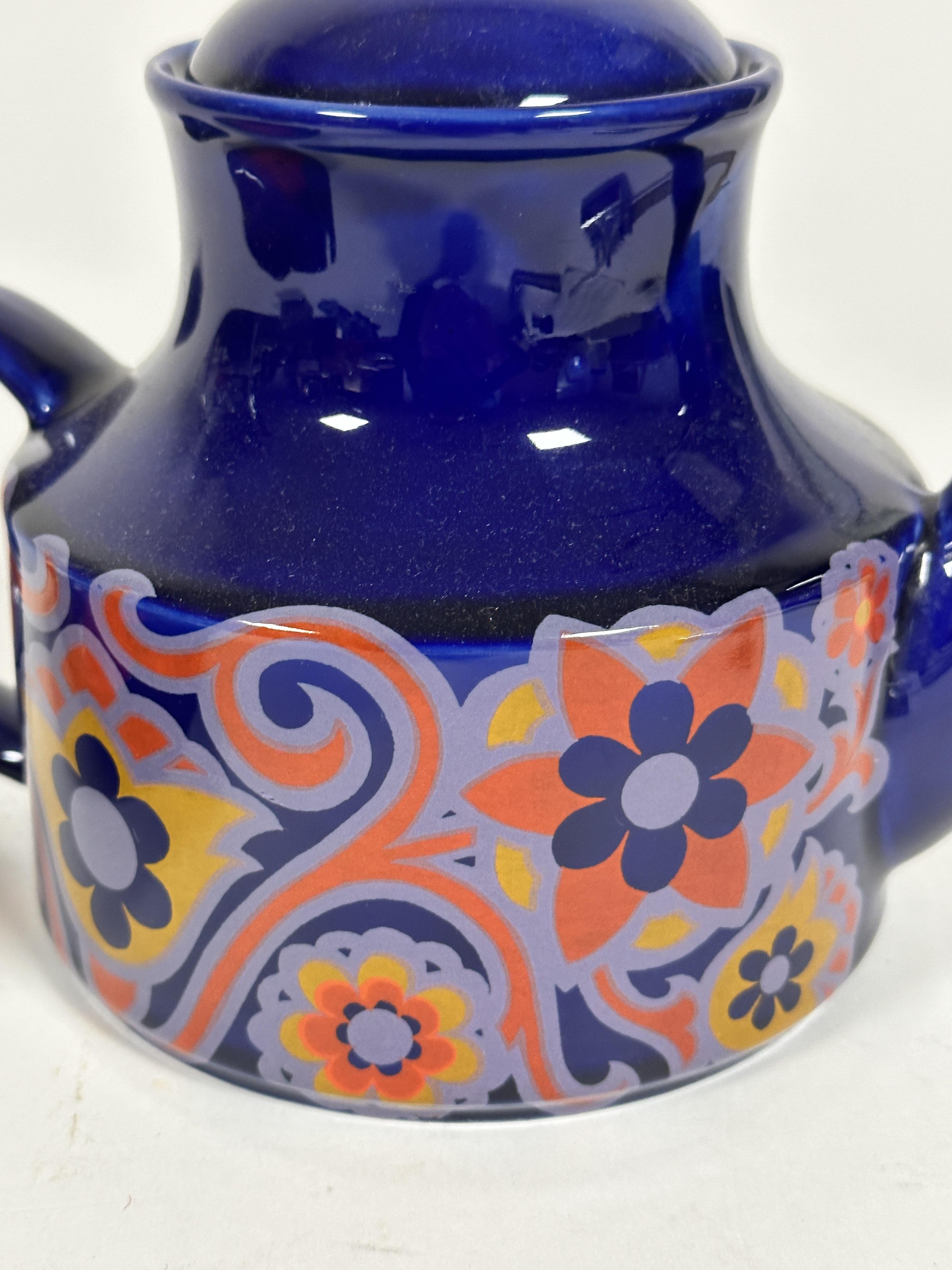 A mid century blue glazed and transfer printed stylised lotus leaf and flower designed teapot ( - Image 2 of 4