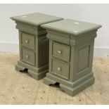 A pair of green painted hardwood bedside chests, each fitted with three drawers raised on bracket