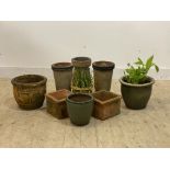 A pair of terracotta chimney pot planters (H35cm) together with seven other planters (9)