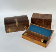 A trio of wooden boxes comprising one tea caddy with walnut veneer and two decorated with metal