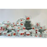 A large Royal Worchester Poppies dinner service comprising, a nut dish (l-34cm) , four serving