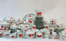 A large Royal Worchester Poppies dinner service comprising, a nut dish (l-34cm) , four serving