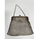 A 1920s Birmingham silver chain mail mesh evening purse with silver chain link handle and all