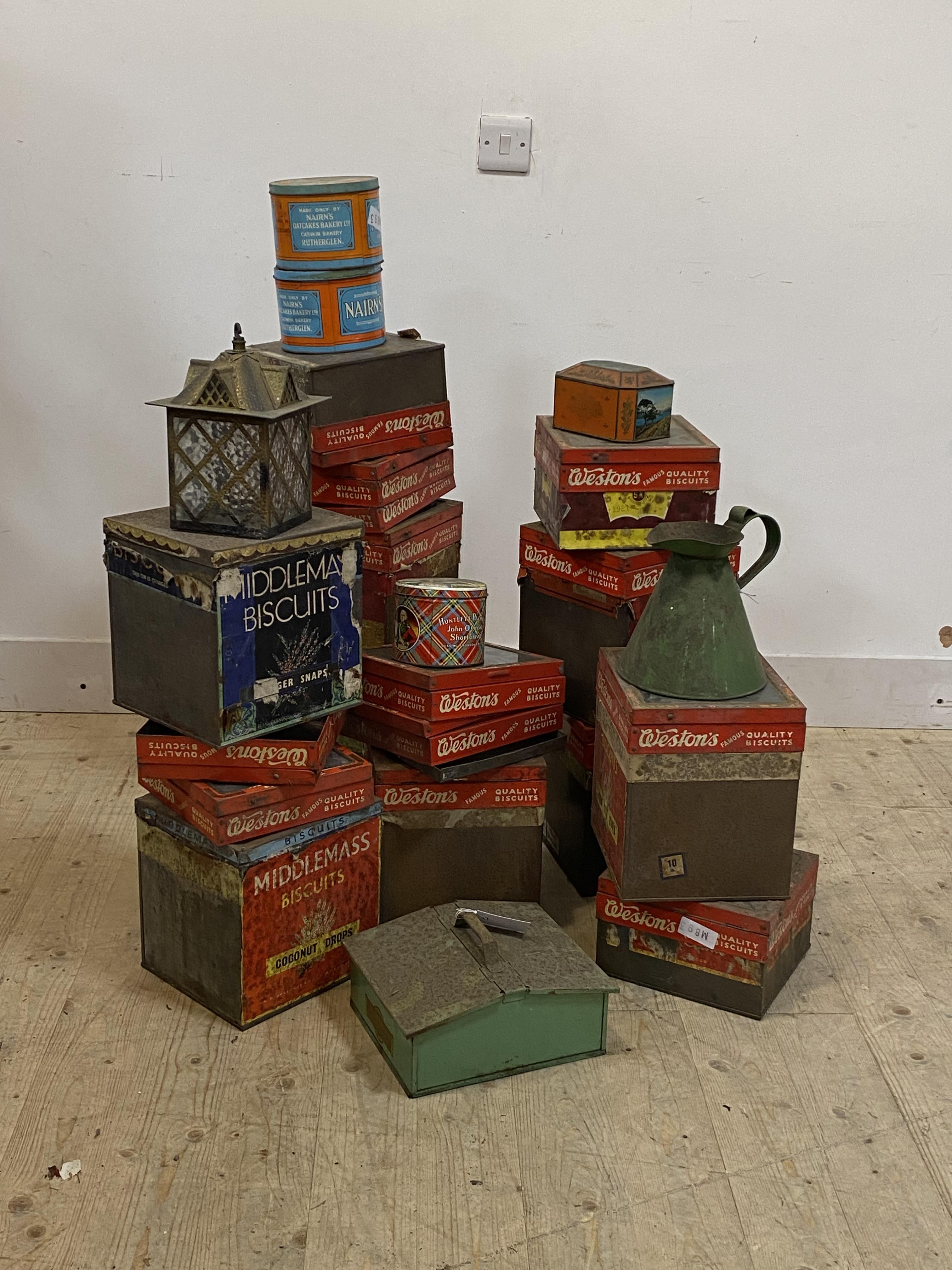 A collection of vintage confectionary tins to include; Middlemass biscuit tins; Huntley and Palmers;