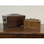 A George III mahogany tea caddy, late 18th century, the brass swing handle over sarcophagus top with
