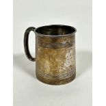 An Edwardian Birmingham silver tapered christening tankard with horizontal linear decoration and C