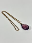 A 9ct gold belcher link chain necklace, (L: 26cm) (8.5g) mounted with oval faceted amethyst glass