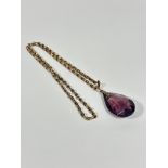 A 9ct gold belcher link chain necklace, (L: 26cm) (8.5g) mounted with oval faceted amethyst glass