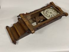 A late 19th century American wall clock, the rosewood case with Tunbridge ware type inlay, white