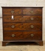 An early 19th century mahogany chest of drawers, fitted with two short and three long graduated