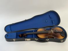 A modern stained wood Glaesel violin and case, with two-piece back and label 'Antonius