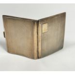 A Birmingham 1929 silver presentation cigarette case with engine turned decoration with engraved