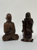 A hardwood seated figure of a Buddha (h- 25cm) with a Balinese wooden figure of a Laohan with a