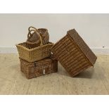 A large wicker lidded box with carry handle to each end and division to interior, together with a