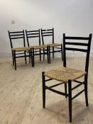 A set of four ebonised dining chairs with string seats, on turned supports, H85cm