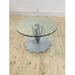 Domus nova, An Italian designer low coffee table, the circular glass top raised on a wrought iron