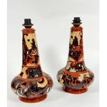 A Keramik Meandalla Klanpok pair of glazed pottery pierced bottle neck style vase lamps with