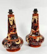 A Keramik Meandalla Klanpok pair of glazed pottery pierced bottle neck style vase lamps with