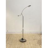 A contemporary articulated brushed aluminium floor standing reading light, H122cm