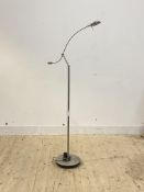 A contemporary articulated brushed aluminium floor standing reading light, H122cm