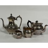 An Epns oval engraved lob style three piece tea service including two handled sugar basin, teapot