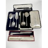 A pair of Epns Walker & Hall fruit servers in a fitted case, a set of three Epns fish and fruit