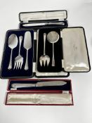 A pair of Epns Walker & Hall fruit servers in a fitted case, a set of three Epns fish and fruit