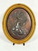 A 19thc bronze bas relief oval panel, probably French, depicting a profile bust of a lady wearing