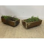 A matched pair of salt glazed stoneware planters, H21cm, L75cm, D41cm