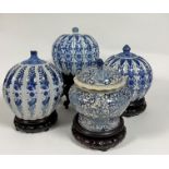 A pair of modern Chinese blue and white porcelain jars of pumpkin form decorated with stylized